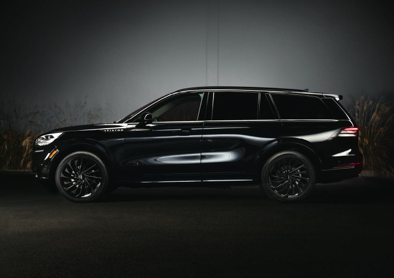 A 2024 Lincoln Aviator® SUV is shown in the Infinite Black exterior color | Lincoln Demo 3 in Wooster OH
