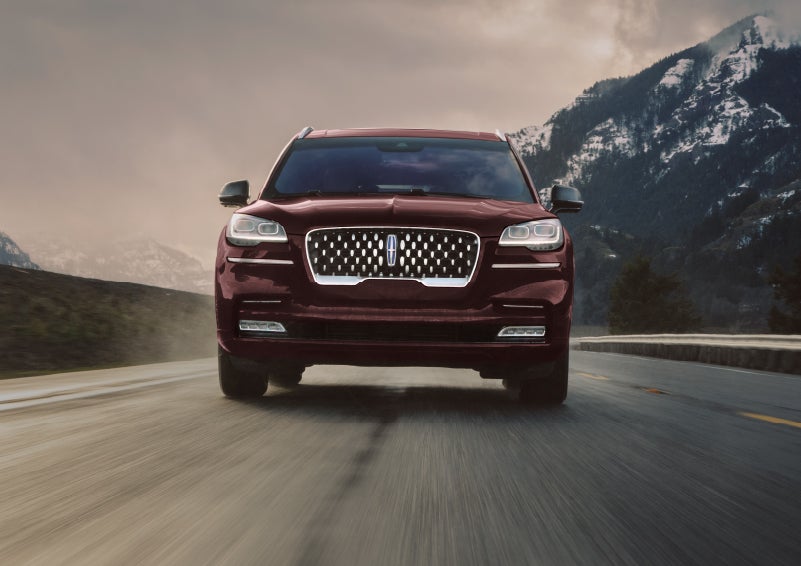 A 2024 Lincoln Aviator® SUV is shown in the Diamond Red exterior color. | Lincoln Demo 3 in Wooster OH