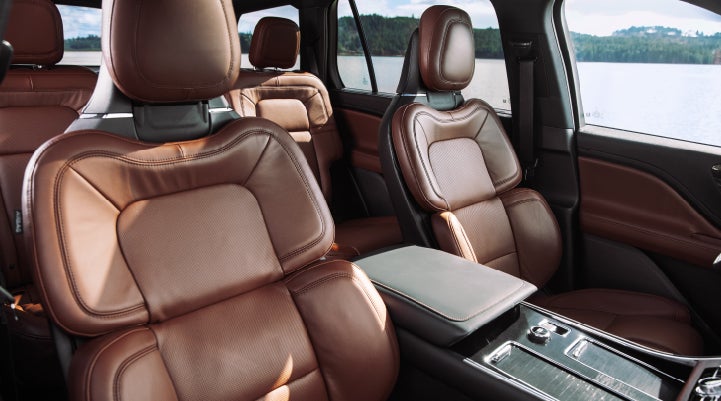 The front row's Perfect Position Seats in a 2024 Lincoln Aviator® Reserve model with Ebony Roast interior | Lincoln Demo 3 in Wooster OH