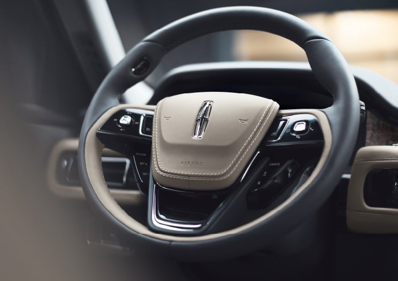 The intuitively placed controls of the steering wheel on a 2024 Lincoln Aviator® SUV | Lincoln Demo 3 in Wooster OH