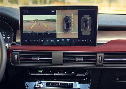 The driver of a 2024 Lincoln Corsair® SUV is shown selecting the drive mode. | Lincoln Demo 3 in Wooster OH
