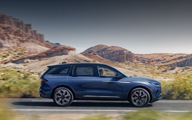 A 2024 Lincoln Nautilus® SUV is being driven in a desert setting. | Lincoln Demo 3 in Wooster OH