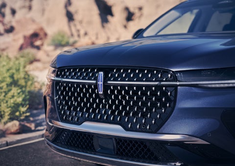 The stylish grille of a 2024 Lincoln Nautilus® SUV sparkles in the sunlight. | Lincoln Demo 3 in Wooster OH