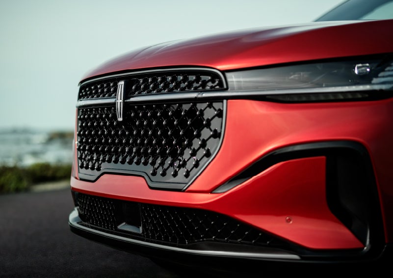 The sleek grille of a 2024 Lincoln Nautilus® SUV with the available Jet Appearance Package makes a bold statement. | Lincoln Demo 3 in Wooster OH