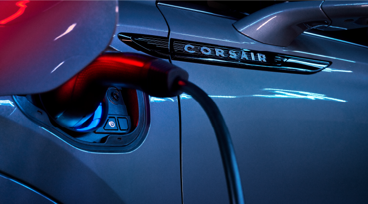 A charger plugged into the charging port of a 2025 Lincoln Corsair® Plug-in Hybrid model. | Lincoln Demo 3 in Wooster OH